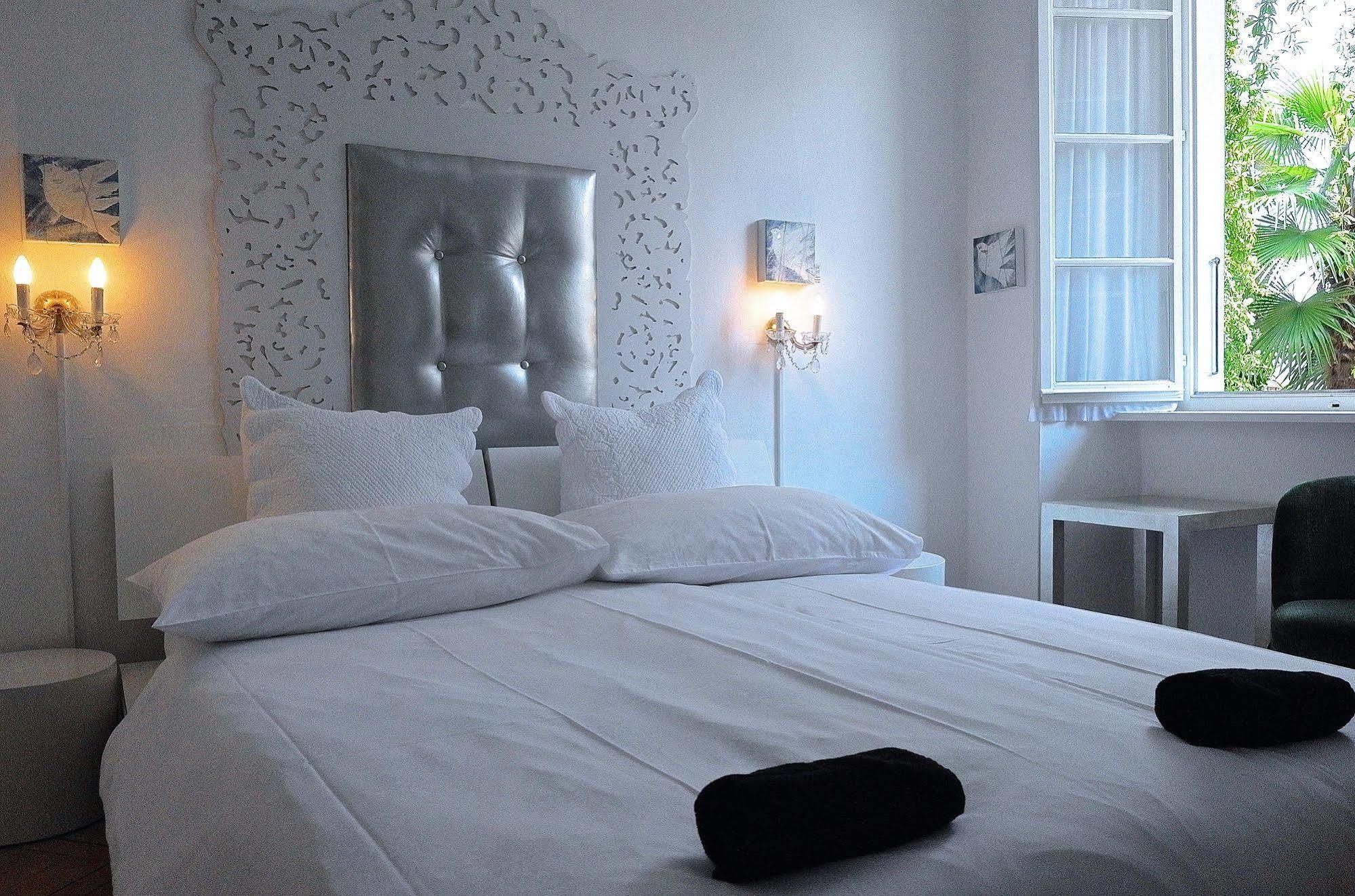 Caffe Dell'Arte Boutique Rooms Locarno Bagian luar foto