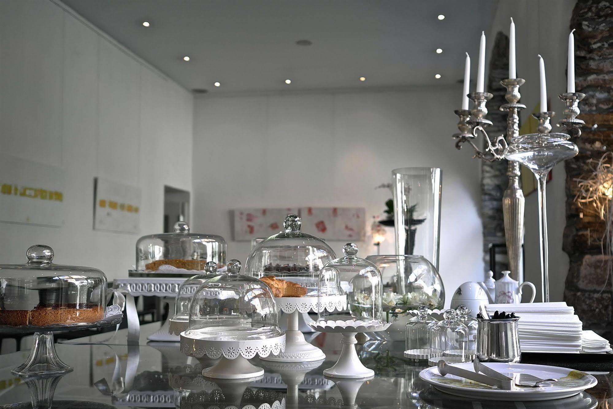 Caffe Dell'Arte Boutique Rooms Locarno Bagian luar foto